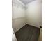 Walk in closet with wire shelving and hardwood floors at 1809 Sw 29Th Ter, Ocala, FL 34474