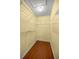Walk-in closet with shelving, hardwood floors, and overhead light at 2158 Nw 50Th Ave, Ocala, FL 34482