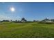 A sunny view of the lush green golf course within this community at 2158 Nw 50Th Ave, Ocala, FL 34482