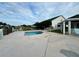 Outdoor hot tub near clubhouse with fencing, seating, and landscaping at 2158 Nw 50Th Ave, Ocala, FL 34482