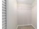 A closet with white walls, light gray wood flooring, and wire shelving at 2220 Ne 41St St, Ocala, FL 34479