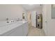 Well-equipped laundry area includes washer, dryer, and water heater for convenience at 2220 Ne 41St St, Ocala, FL 34479