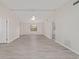 Bright living room featuring neutral paint, modern floors and a ceiling fan at 2220 Ne 41St St, Ocala, FL 34479