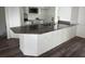 Kitchen island with granite countertop and ample storage space at 227 Fisher Run, Ocklawaha, FL 32179