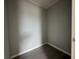Walk-in closet with gray walls and tiled flooring, providing ample storage space at 28 Bahia Pass Dr, Ocala, FL 34472