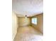 Bright living room featuring a ceiling fan, tile floors, and a large window at 2848 Se 11Th St, Ocala, FL 34471