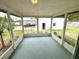This screened-in porch has a concrete floor and screens at 2848 Se 11Th St, Ocala, FL 34471