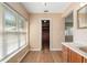 Bathroom featuring a vanity with storage and natural lighting at 3950 Se 10Th Ln, Ocala, FL 34471