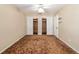 Bedroom features carpeting, neutral paint, two cedar closets and a ceiling fan at 3950 Se 10Th Ln, Ocala, FL 34471