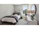 Cozy bedroom with a comfortable bed, soft lighting, and serene decor at 4301 Sw 54Th Street Rd, Ocala, FL 34474