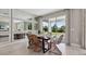 Dining room featuring a stylish table, comfortable seating, and sliding glass doors at 4301 Sw 54Th Street Rd, Ocala, FL 34474
