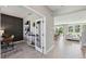 Bright foyer showcasing a modern design with stylish decor, leading to the living spaces at 4301 Sw 54Th Street Rd, Ocala, FL 34474