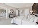 Bright main bedroom features plush carpet, an ensuite bathroom, and a contemporary design at 4301 Sw 54Th Street Rd, Ocala, FL 34474