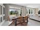 Bright dining room featuring a dining table with six chairs and a sliding glass door to the outdoor area at 4317 Sw 54Th Street Rd, Ocala, FL 34474