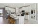 Stylish kitchen featuring white cabinetry, stainless steel appliances, and a spacious island at 4317 Sw 54Th Street Rd, Ocala, FL 34474
