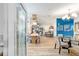 Open-concept living space featuring a modern dining area, comfortable seating, and stylish decor at 514 Saint Andrews Blvd, Lady Lake, FL 32159