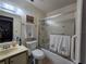 Bathroom featuring vanity, toilet, and shower/tub combo with updated hardware at 519 Fairways Cir # A, Ocala, FL 34472