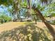 Expansive lawn and mature trees offer privacy and shade to this lovely condo community at 519 Fairways Cir # A, Ocala, FL 34472
