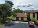 Attractive condo with well-maintained landscaping and a convenient parking area for guests at 519 Fairways Cir # A, Ocala, FL 34472
