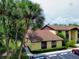 This cozy condo boasts lush landscaping, a convenient walkway, and ample parking, creating a welcoming and accessible exterior at 519 Fairways Cir # A, Ocala, FL 34472