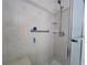Shower with updated shower head and safety bars at 519 Fairways Cir # A, Ocala, FL 34472