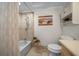 Bathroom featuring a tub with shower, neutral walls and tile, and a vanity with countertop at 530 Sw 35Th St, Ocala, FL 34471