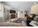 View of the living room featuring neutral tones, comfortable seating and modern decor, creating a welcoming space at 530 Sw 35Th St, Ocala, FL 34471