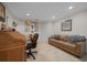 Bright office space with a brown leather couch and a collection of equestrian and religious artwork at 530 Sw 35Th St, Ocala, FL 34471