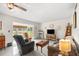 Spacious living room featuring natural light and comfortable seating, perfect for relaxation at 546 Midway Dr # B, Ocala, FL 34472