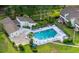 Aerial view of a pool surrounded by lush greenery and lounge chairs at 546 Midway Dr # B, Ocala, FL 34472
