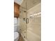 Modern glass shower with a sleek shower head and built-in shelving at 546 Midway Dr # B, Ocala, FL 34472