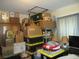 Bedroom filled with boxes and furniture at 5949 Se 164Th Ct, Ocklawaha, FL 32179