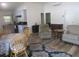 Open living room with a dining table and chairs, flowing into the kitchen at 5949 Se 164Th Ct, Ocklawaha, FL 32179
