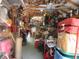 Interior of shed shows storage, tools, and work space at 5949 Se 164Th Ct, Ocklawaha, FL 32179