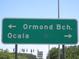 Road sign pointing towards Ormond Beach and Ocala, offering convenient navigation for travelers at 5949 Se 164Th Ct, Ocklawaha, FL 32179