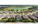 Aerial view of homes and community with lake and golf course at 6394 Sw 97Th Terrace Rd, Ocala, FL 34481