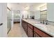Spacious Primary bath with double vanity, granite countertop, walk-in shower and tile flooring at 6394 Sw 97Th Terrace Rd, Ocala, FL 34481
