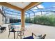 Inviting screened lanai and patio with a relaxing pool and spa, perfect for outdoor living at 6394 Sw 97Th Terrace Rd, Ocala, FL 34481