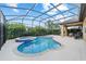 Beautiful screened-in pool and spa with outdoor patio area for gatherings at 6394 Sw 97Th Terrace Rd, Ocala, FL 34481