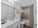 Clean bathroom with modern vanity, shower, tub, and elegant fixtures at 6689 Nw 61St St, Ocala, FL 34482
