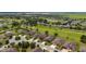 Beautiful neighborhood with green spaces, manicured lawns, and tree-lined streets at 6868 Sw 95Th Cir, Ocala, FL 34481