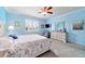 Cozy bedroom retreat featuring carpet, ceiling fan, and bright, natural light at 6868 Sw 95Th Cir, Ocala, FL 34481
