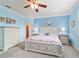 Comfortable bedroom with carpet, ceiling fan, and neutral decor at 6868 Sw 95Th Cir, Ocala, FL 34481