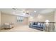 A view of the bonus room with large windows and comfortable seating at 6868 Sw 95Th Cir, Ocala, FL 34481
