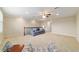Expansive bonus room featuring neutral carpet and ample natural light at 6868 Sw 95Th Cir, Ocala, FL 34481