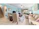Bright living room featuring a fireplace, ceiling fan, tile floors, and sliding glass door to patio at 6868 Sw 95Th Cir, Ocala, FL 34481