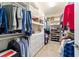 Organized walk-in closet offers ample storage with built-in shelving and hanging space at 6868 Sw 95Th Cir, Ocala, FL 34481