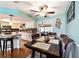Cozy dining area featuring granite counters and a view of the living area at 8140 Sw 109Th Street Rd, Ocala, FL 34481