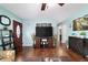 Comfortable living room with warm wood floors and lots of natural light at 8140 Sw 109Th Street Rd, Ocala, FL 34481