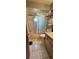 Bathroom featuring a bathtub, shower, vanity, and tiled floor at 8244 Sw 106Th Pl, Ocala, FL 34481